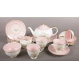 A Susie Cooper Eighteen Piece Tea Set in the 'Azalea' design. To include: Teapot, Serving Plate