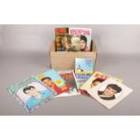 A Collection of Elvis Memorabilia. Includes 'Elvis Mania' and Annuals.