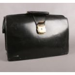 A vintage leather satchel style briefcase.