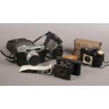 A group of Vintage camera's. Kodak Eastman Vest pocket ( U.S. patents 1902-1913), Yashica Minister