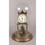 A Perpetual Motion Brass Mantle Clock with Glass Dome. Condition Fair, in need of attention.