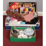 A box of Miscellaneous. To Include a collection of Ceramics, a series of Linen and Magic Trick Game.