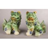 A pair of ceramic Chinese temple lions/ dogs of Fu. 32.5cm h.