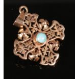 A 14ct Rose Gold and Turquoise Cross, can be worn as a Pendant or a Brooch. Total Weight: 3.68g