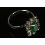 A 1950's Christian Dior Dress Ring, with Faux Emerald surrounded by Diamond Paste.