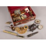 A case of collectables. Including vintage sprit levels, pens knives, tortoise paperweight,