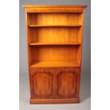 A Yew Wood Two Shelf Open Bookcase with Lockable Lower Cabinet. H: 182cm, W: 95cm.