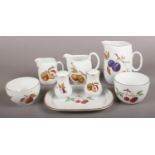 A Collection of Royal Worcester Evesham Ceramics. To Include Salt and Pepper Shakers, Sugar Bowl and