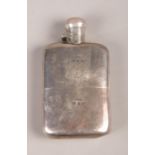 A Silver Stokes and Ireland Ltd. Hip Flask with Removable Base. Engraved with the Cartouche RT.