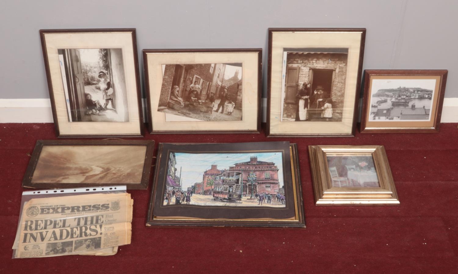 A group of seven framed photographs and pictures. To include photographs of Whitby and village life,