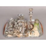 A Piquot aluminium tray with an assortment of EPNS oddments. To include flask, napkin rings, and