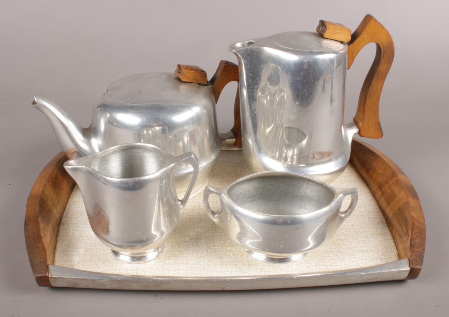 A five piece Piquet ware tea set and tray.