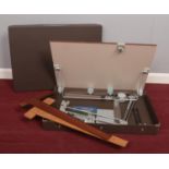 A Tecnostyl 624 vintage portable drafting/drawing board with mechanical arm.