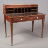 An Victorian rosewood writing desk with leather inset top.