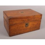 A Victorian mahogany tea caddy.