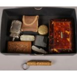 A box of collectables. Including tortoise shell box, coin case, pen knives, etc.