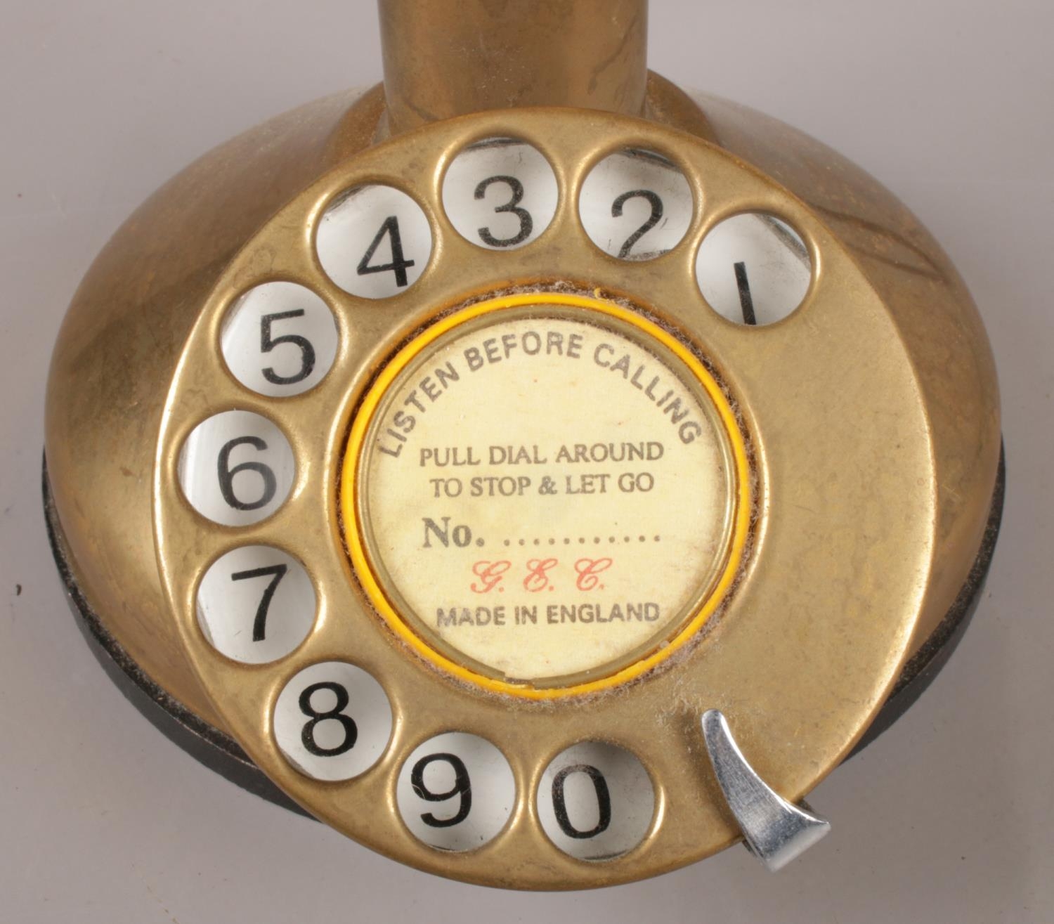 A stick brass telephone. Comprising of a ring dial to the circular base and etched to the front G - Image 3 of 3