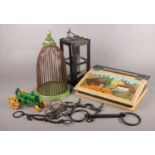 An assorted group of items. To include a decorative bird cage, a Christopher Cross & Co Lantern, and