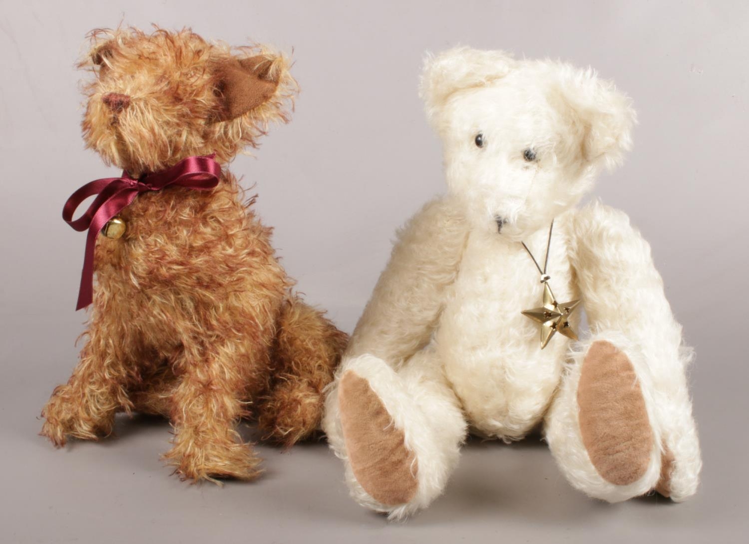 Two vintage jointed soft toys. To include a teddy bear and dog. Tallest: H:42cm.