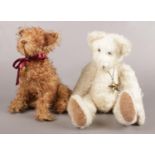 Two vintage jointed soft toys. To include a teddy bear and dog. Tallest: H:42cm.