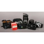 A Box of Film Cameras and Camera Equipment. To include Cameras from Kodak, Balda and Ricoh.