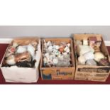 Three boxes of miscellaneous. Vases, ceramic bells, vintage tins.