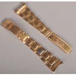 A gold plated stainless steel Rolex watch bracelet clasp A/F.