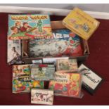 A box of assorted games, mainly vintage examples.