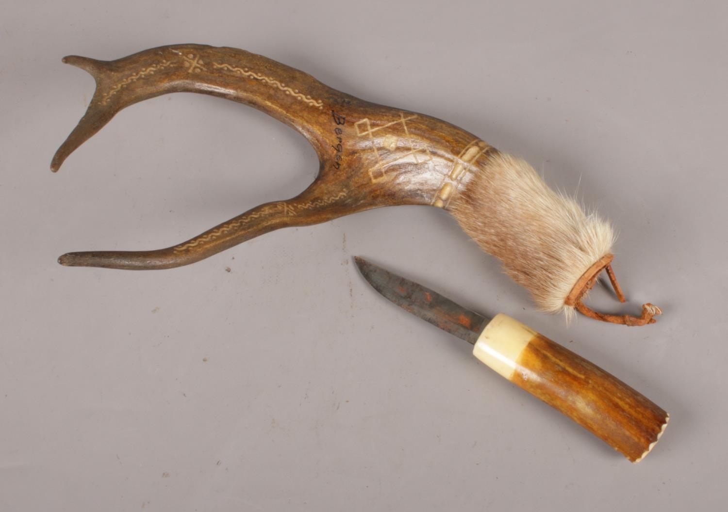 A Carved Antler Knife, complete with Antler Sheath, Stamped 'Bergen'.