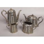 A silver plated 4 piece tea set.