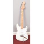 A Stratocaster style electric guitar.