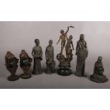 A group of assorted figures. Comprising of composite Leonardo African figures and a cast metal