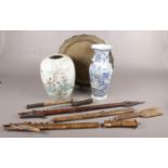 A collection of oriental items. Includes vases, dagger etc.