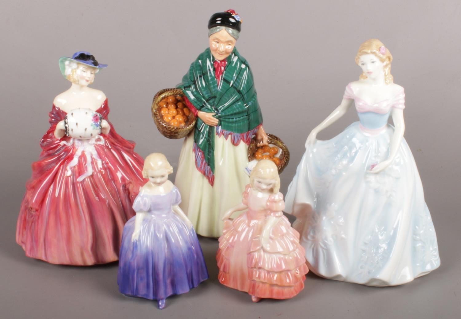 A Collection of Five Royal Doulton Figurines. To include: HN1962 'Genevieve', HN1953 'Orange