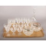 Twenty one pieces of glassware. To include a decanter and nineteen glasses, together with two rose