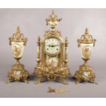 A decorative brass mounted clock garniture, decorated with scenes of courting couples.