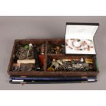 A cutlery tray with an assortment of collectables. To include a boxed conductors baton and enamel