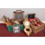 Two boxes of assorted quartz wall clocks.