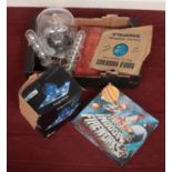 A box of miscellaneous. Includes Harman Kardon Soundsticks II speakers, indoor fireworks etc.