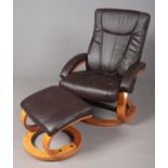 A modern Leatherette reclining chair & footstool.