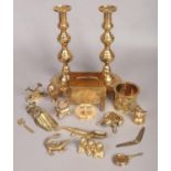 A quantity of brassware. Including pair of candlesticks, brass animals, letter rack, nut crackers,