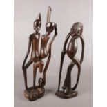 Two large carved hardwood African figures. Tallest 60cm.