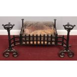 A Wrought Iron Fireplace Insert.