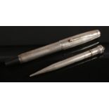A Silver Fountain Pen and Propelling Pencil. Fountain Pen Assayed for Birmingham 1948, with maker'