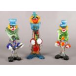 Three Murano glass clown figures. Damage to bow tie on figure with orange buttons.
