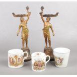 A group of miscellaneous. Two spelter ware figures, three commemorative mugs.