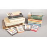 A collection of books and Top Trumps. Incudes Ladybird books, novels etc.