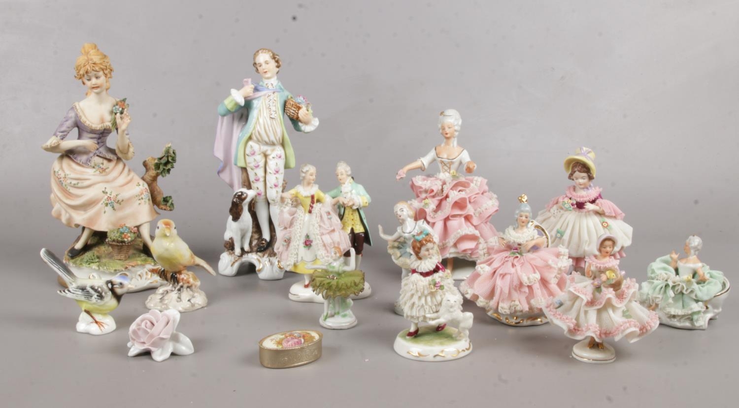 A group of assorted ceramic figurines. Dresden etc