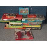 A quantity of vintage games and toys. Including Hot Wheels with carry case, Jigsaws, Draughts, etc.