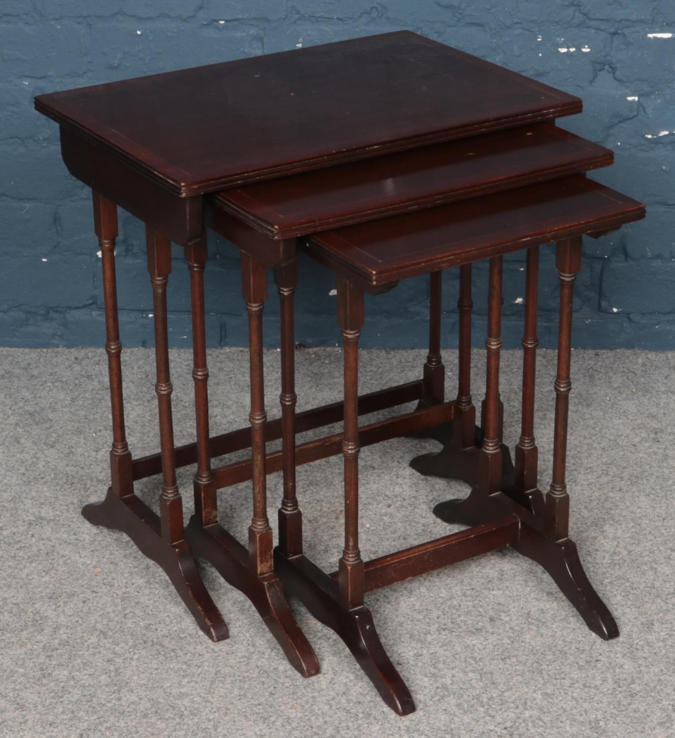 A Mahogany Nest of Three Occasional Tables.